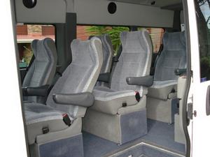 9 Luxury Reclining Seats in rear with arm rests